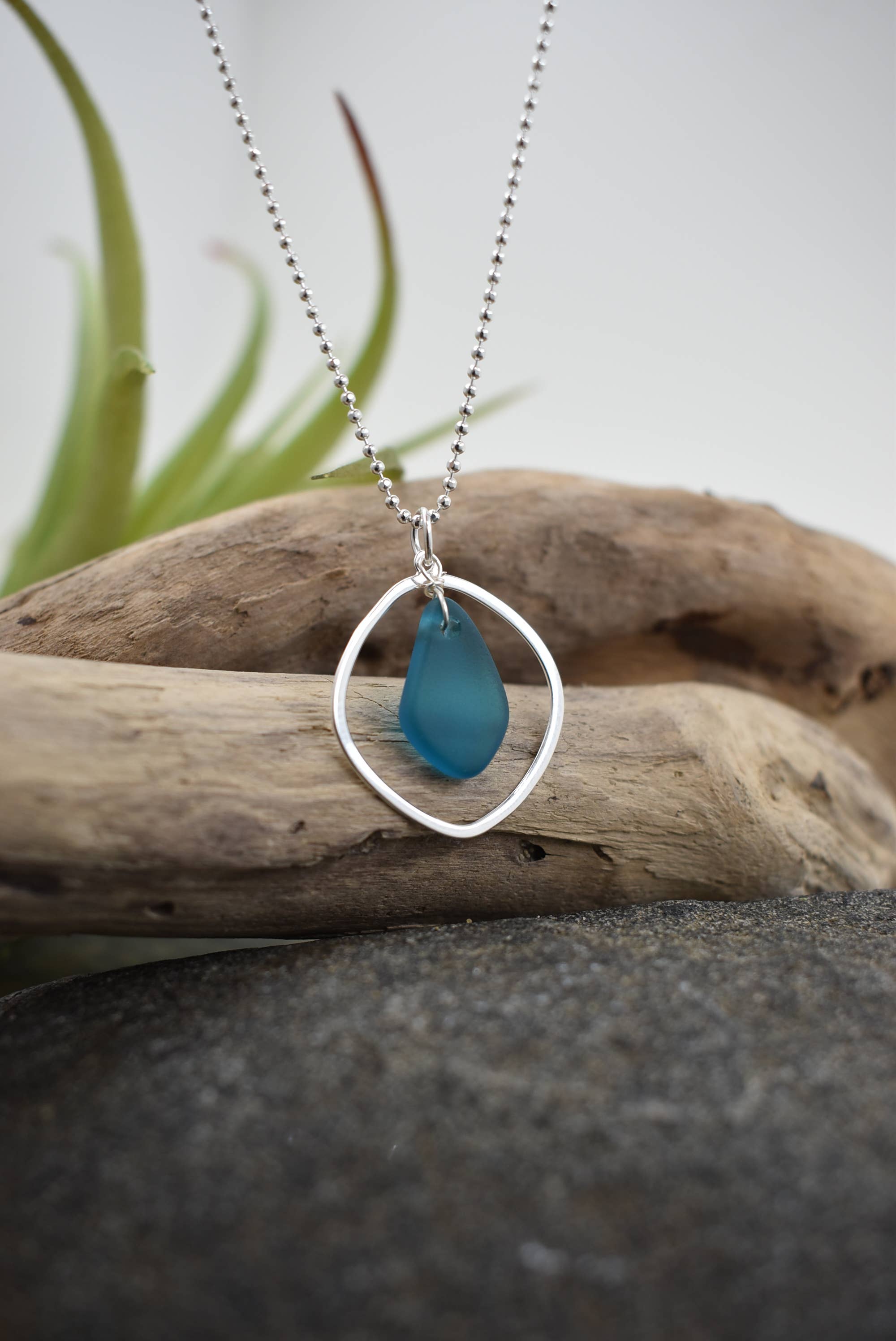 Silver pendant necklace with teal sea glass