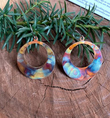 Lifestyle image of Boho Large circle earrings worn, showcasing their unique colors and stylish appeal.