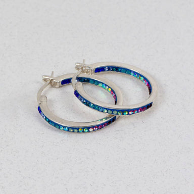 Crystal & Silver Extra Large Hoop Earrings showcasing a dazzling design that shines from every angle, perfect for versatile elegance in any outfit.