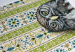 Framed art print of an owl on a patterned background