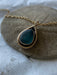 Beautiful Mermaid Tear Necklace featuring authentic sea glass pendant, handcrafted sterling silver bezel, and warm 14k gold fill accents.