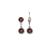 Pair of silver drop earrings with red gemstones