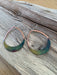 Wearing Rounded Teardrop Fire Painted Copper Earrings styled casually, demonstrating their light and airy feel, ideal for enhancing any outfit.