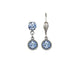 Pair of silver earrings with blue gemstones