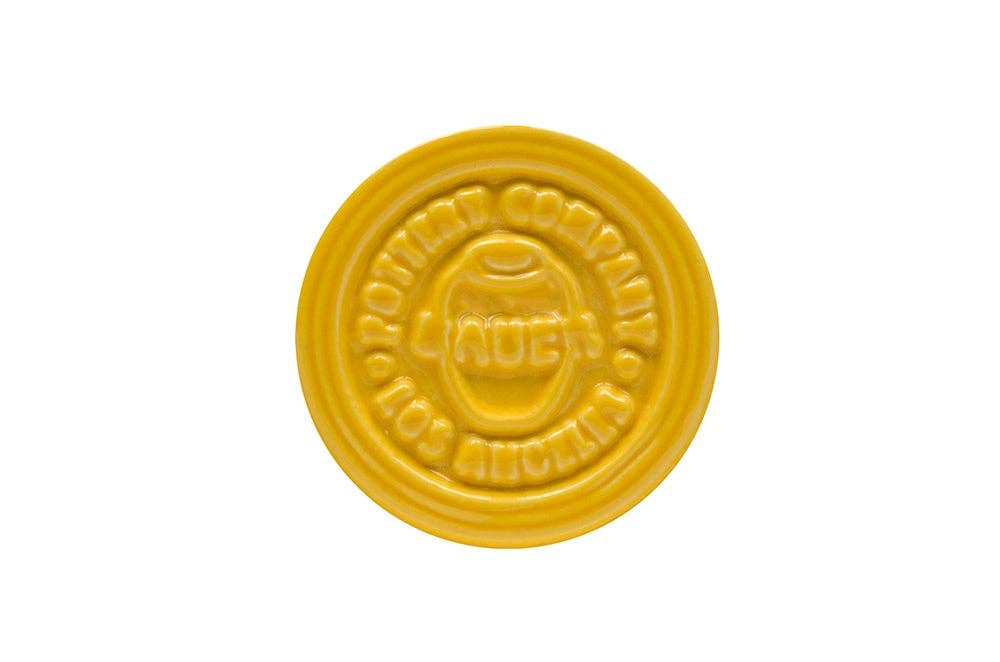 yellow ceramic stamp with Bauer Pottery Company