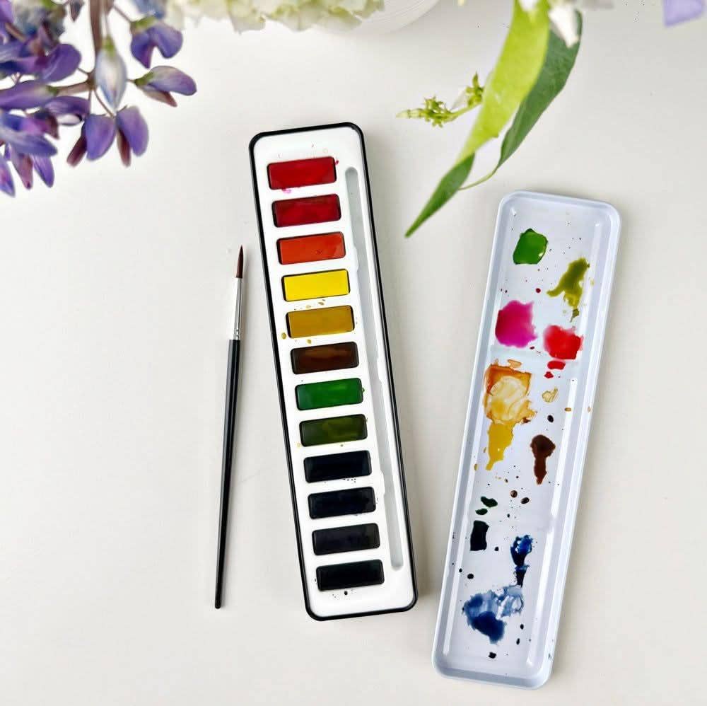 Artistic creation using the watercolor paint set 12 colors, demonstrating mixing capabilities.