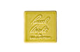Yellow square tile with 'Russel Wright by Bauer Pottery' text on a white background