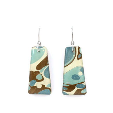 Close-up of blue and chocolate brown marble dangle modern earrings - Showcasing the artistic marbling detail and lightweight design for sensitive ears.