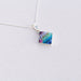 Delicate Diamond Pendant by Mosaico Jewels showcasing its intricate design and sparkling charm.