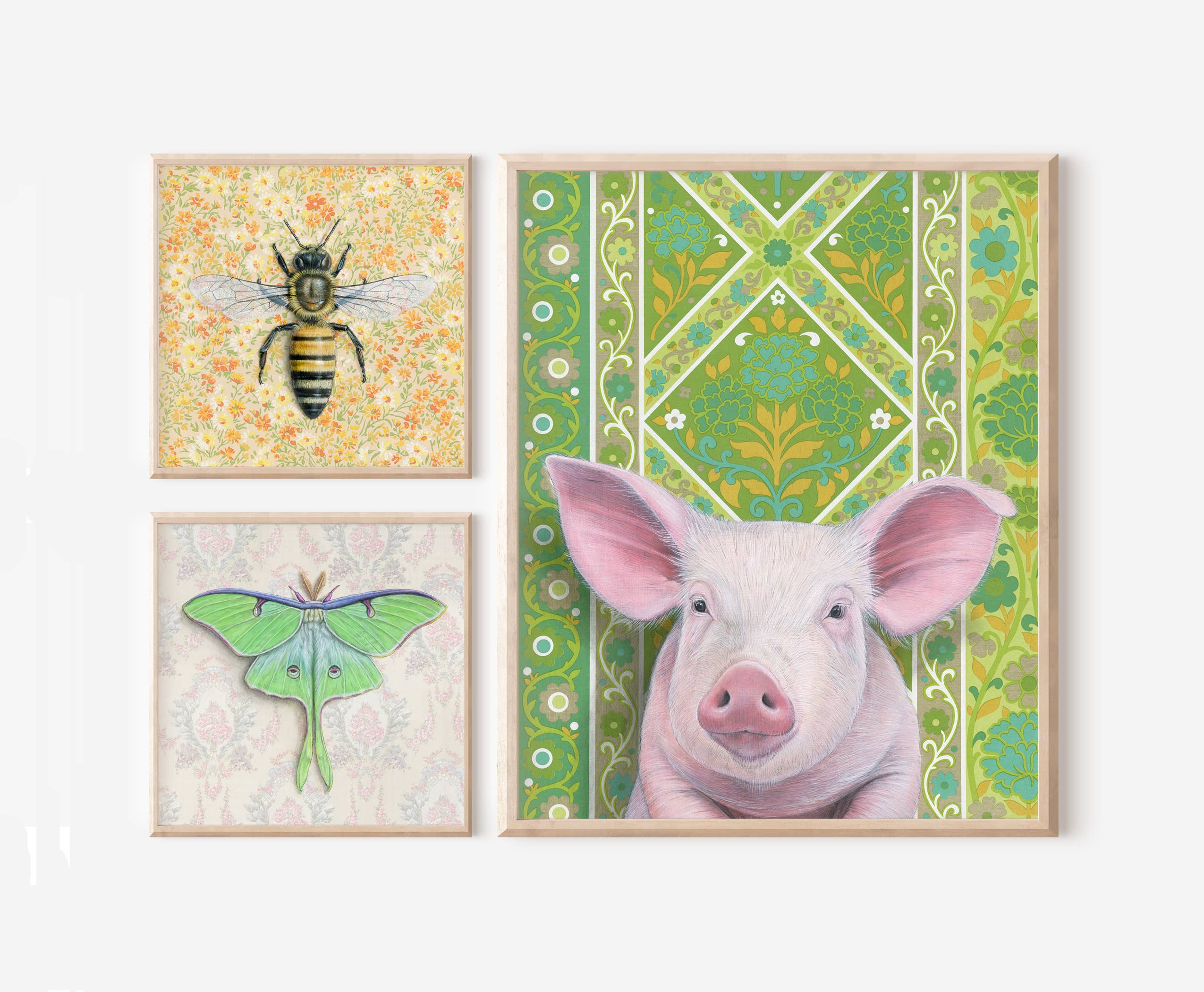 Three framed fine art prints showcasing a pig, bee, and moth with vintage floral backgrounds, created by Emily Uchytil. Pig - Fine Art Print - Farm Animal Illustration.