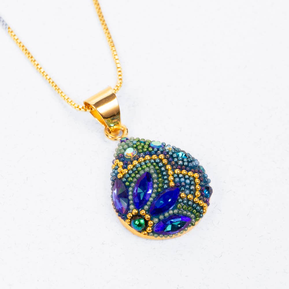 Shimmering 18K Gold Plated Handmade Blue Crystal Drop Pendant - A Unique Royal Statement Piece that even royalty would approve!