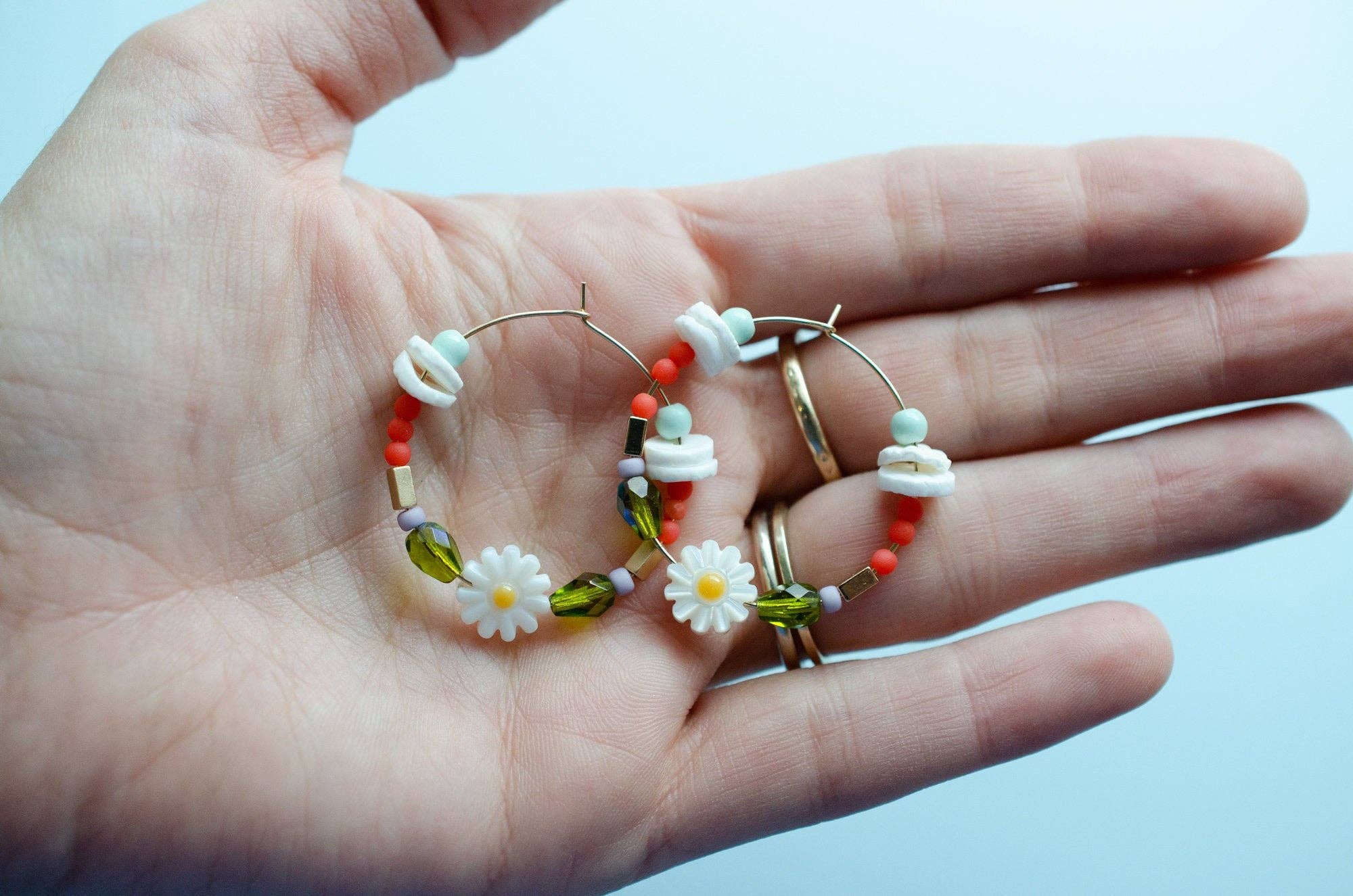 beaded hoop earrings with flower