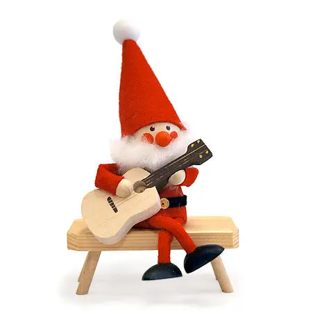 santa gnome playing guitar