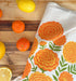 Mari Berry (Marigold, Strawberry) - Tea Towel Set of 2 shown in a charming display, highlighting vibrant marigold and strawberry patterns.