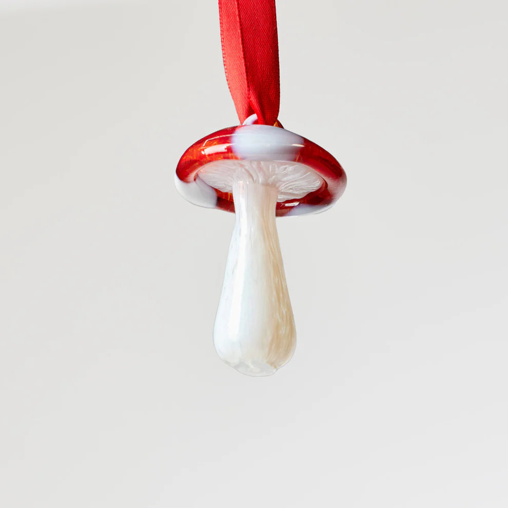 Decorative mushroom ornament with red cap and white stem 