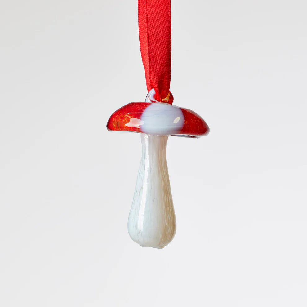 Decorative mushroom ornament with red cap and white stem 