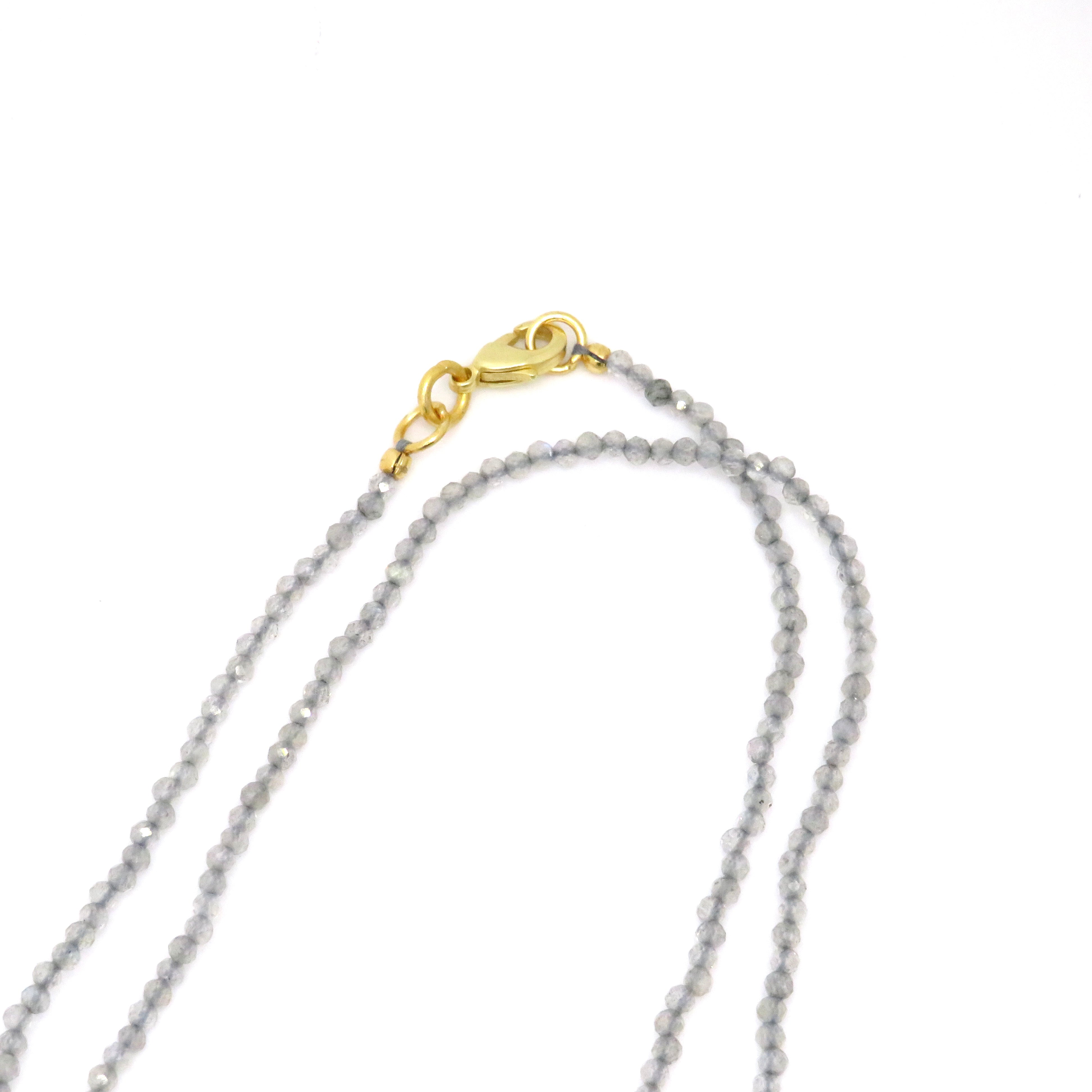 long gemstone necklace with gold clasp