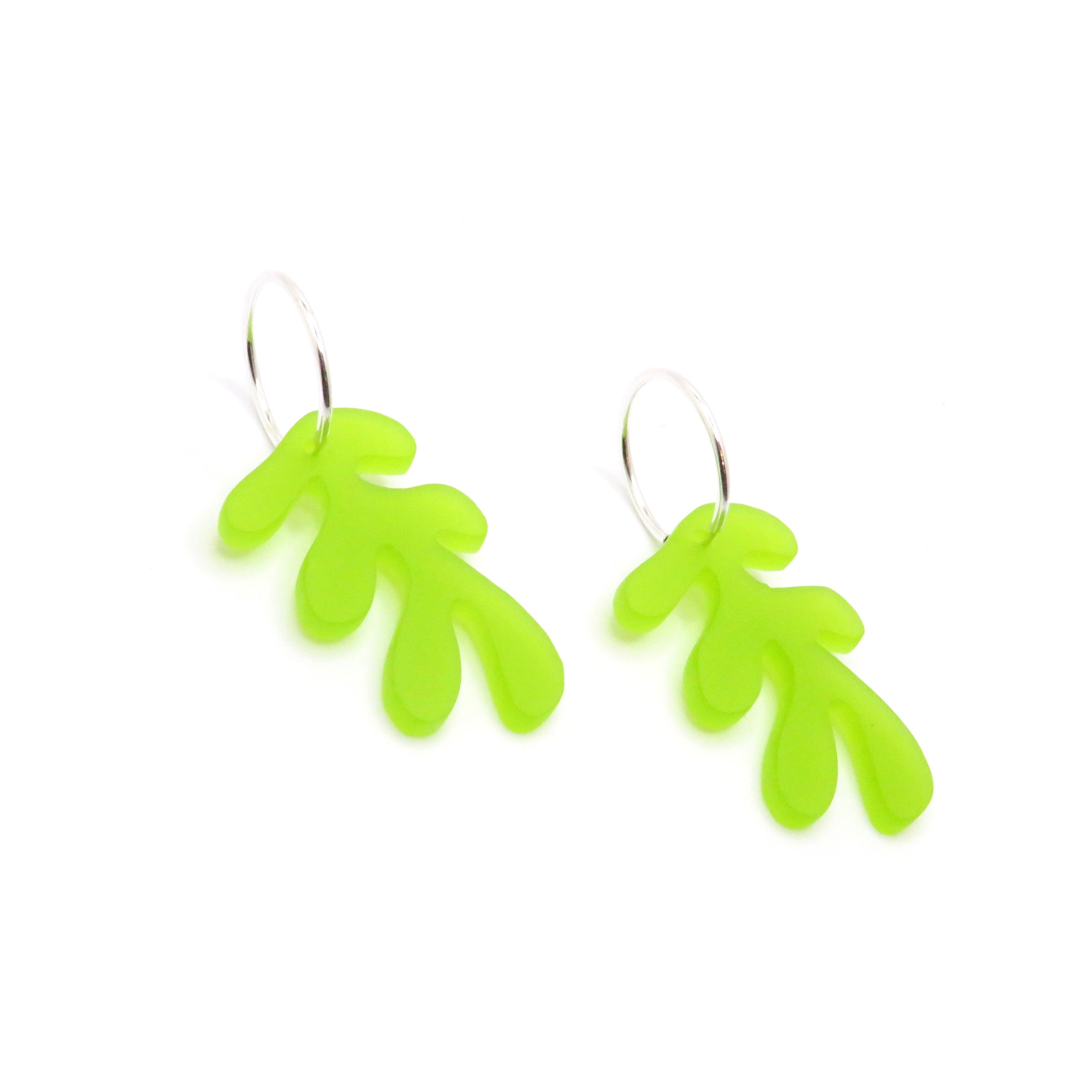 Hoop earrings with green charm