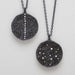 Two black druzy diamond pendants on chains 