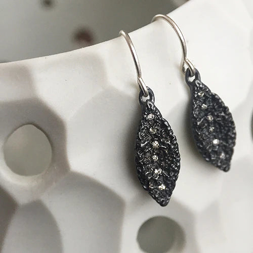 Black Silver leaf earrings with textured design with diamonds