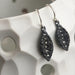 Black Silver leaf earrings with textured design with diamonds