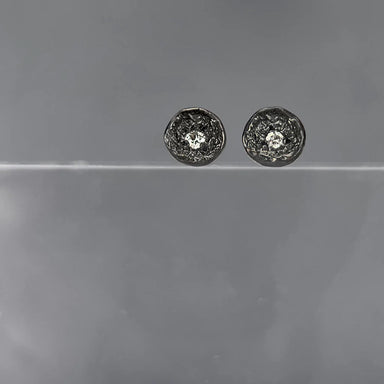 Pair of black silver stud earrings 