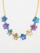 Blissful Bouquet Necklace featuring handcrafted niobium blossoms in shades of indigo, violet, aqua, and gold, adorned with crystal accents on a gleaming chain.