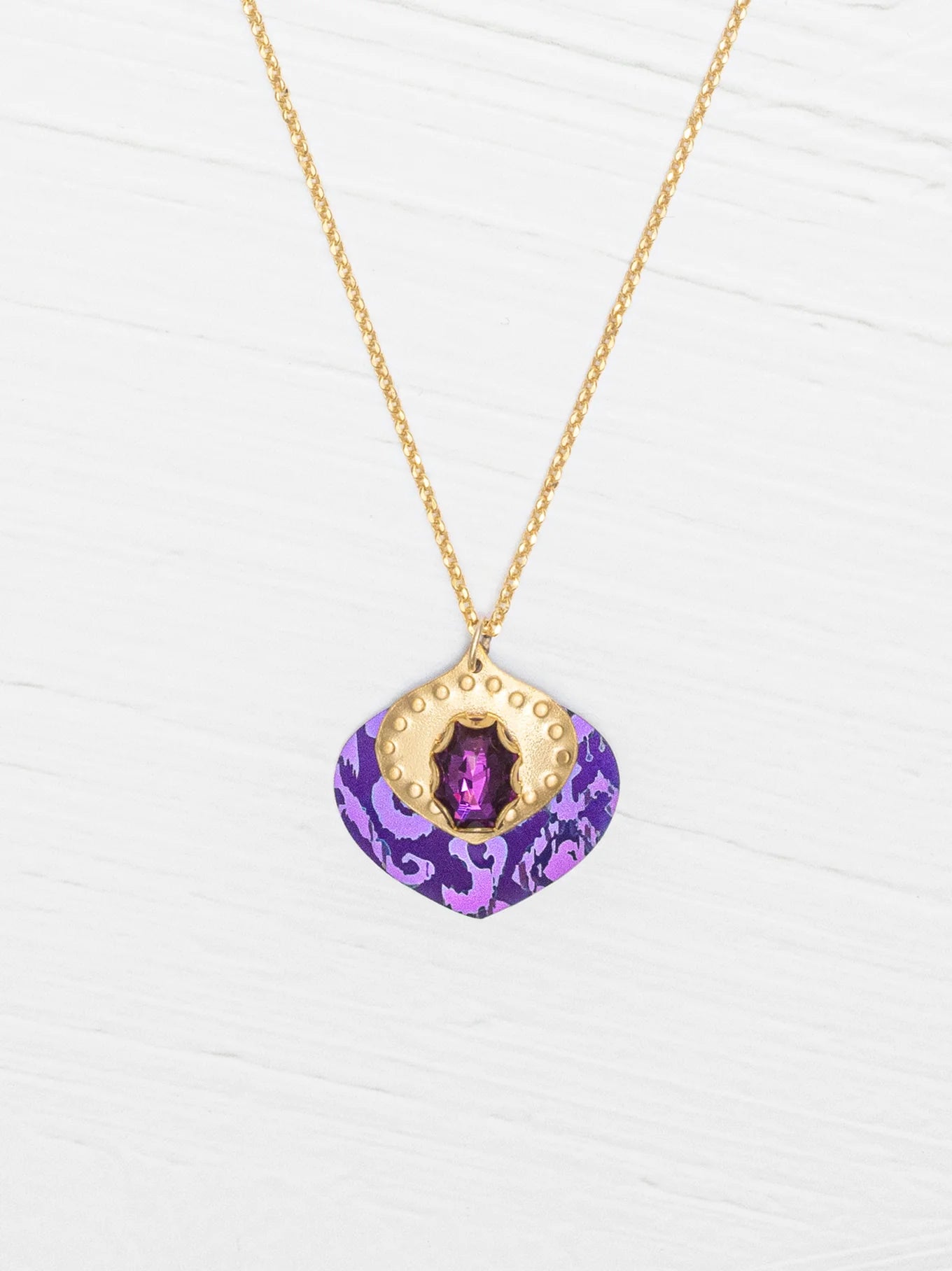 Close-up view of the Arabella Pendant Necklace showcasing its unique niobium craftsmanship and vibrant colors.