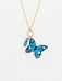 Mariposa Butterfly Charm Pendant Necklace featuring a stunning handcrafted design, made with niobium, 18K gold-plated accents, and adorned with crystal and amethyst, showcasing a beautiful play of color and texture.