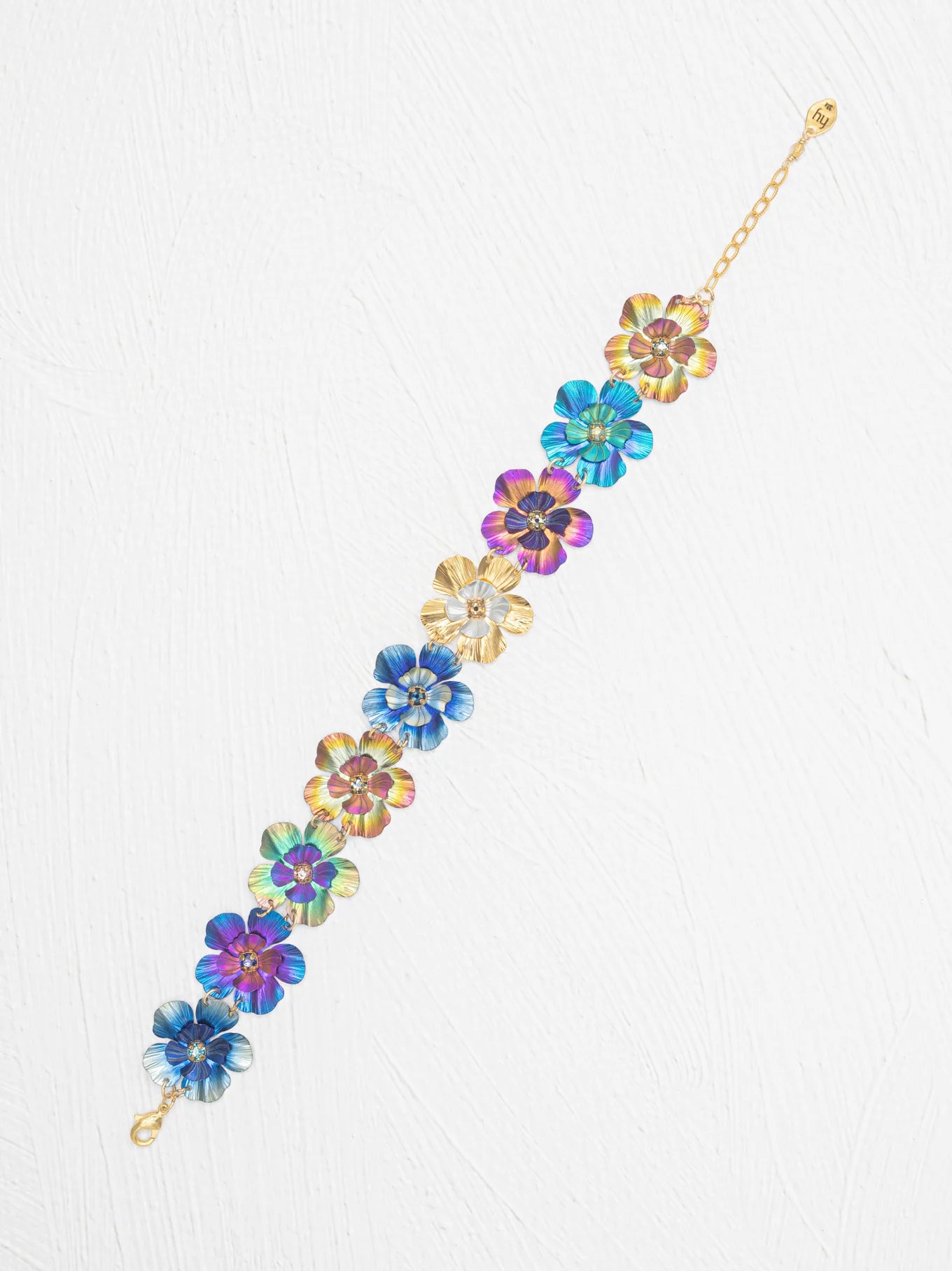 Blissful Bouquet Bracelet featuring colorful niobium flowers with crystal-lit centers, handcrafted by Holly Yashi.