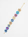 Blissful Bouquet Bracelet featuring colorful niobium flowers with crystal-lit centers, handcrafted by Holly Yashi.