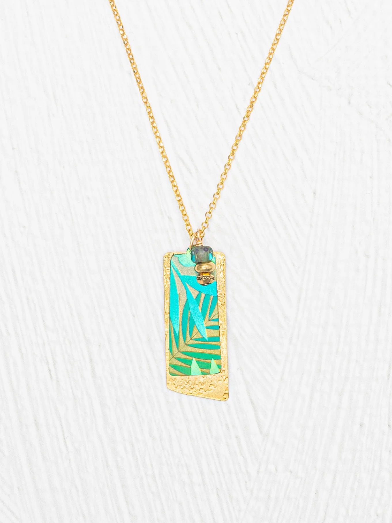 Davy Pendant Necklace by Holly Yashi featuring an adjustable design, niobium, and glass beads with 18K gold plating.