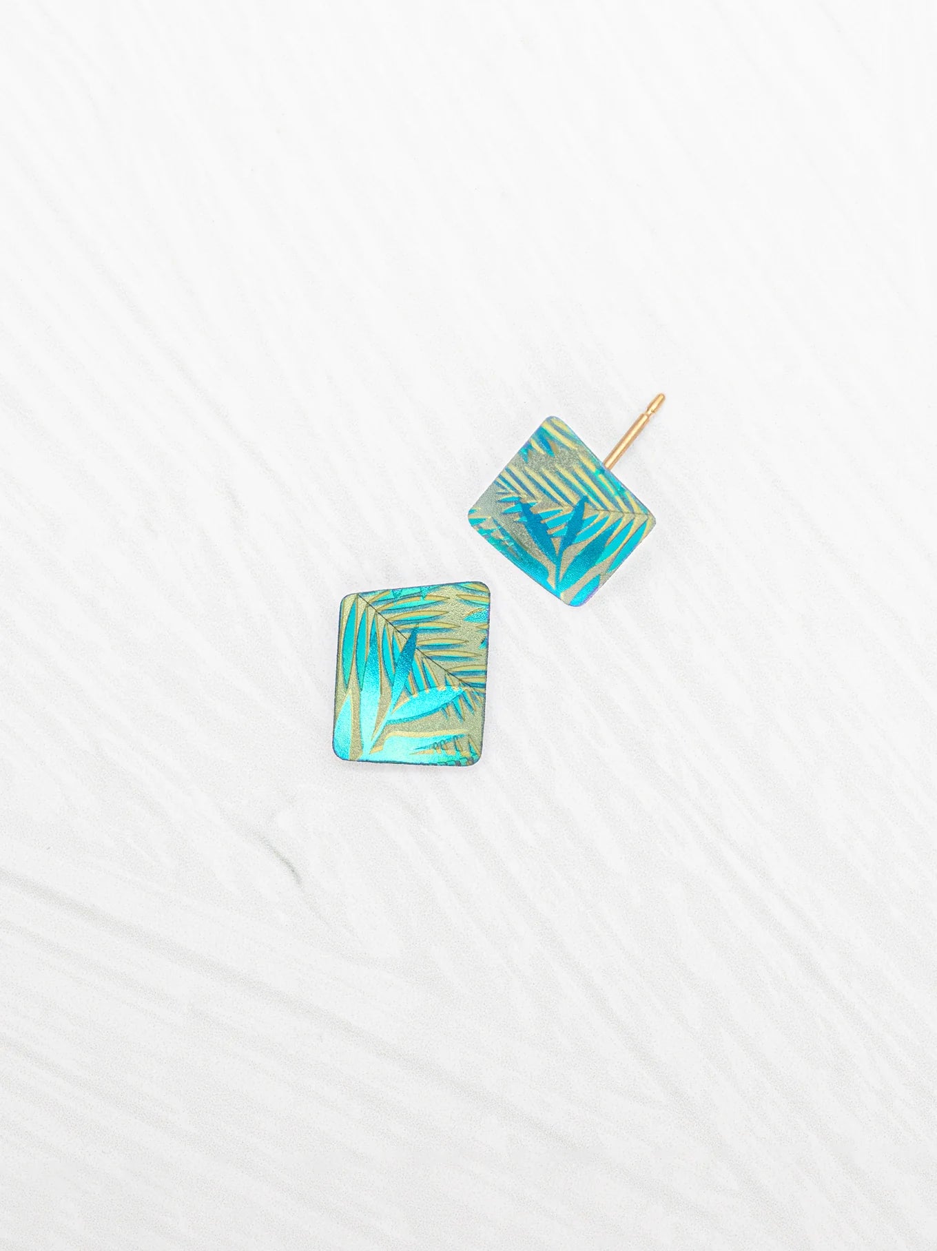 Rae Stud Earrings by Holly Yashi showcasing stylish and elegant design, crafted from niobium with gold fill posts.