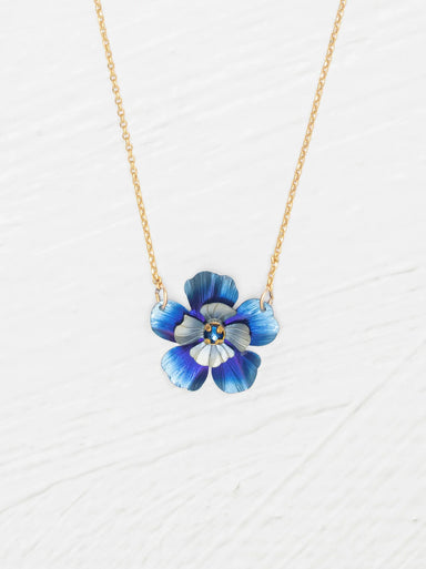 Blissful Bloom Pendant Necklace showcasing a stunning floral design with a crystal, handcrafted in niobium and gold plating.