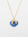 Arabella Pendant Necklace featuring a vibrant glass stone and textured gold on a glowing niobium backdrop.