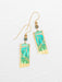 Davy Earrings by Holly Yashi showcasing stunning design with gold fill ear wires and niobium, featuring an elegant 18K gold-plated finish.