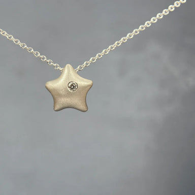 Silver star pendant with diamond necklace