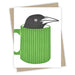 Bird sitting in a green coffee mug greeting card