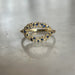 Gold clustered ring with blue gemstones 