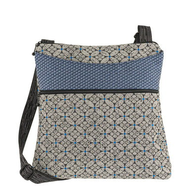 Spree Bag by Maruca in a stylish grey and blue pattern, designed with an adjustable strap and several pockets for easy access and organization.