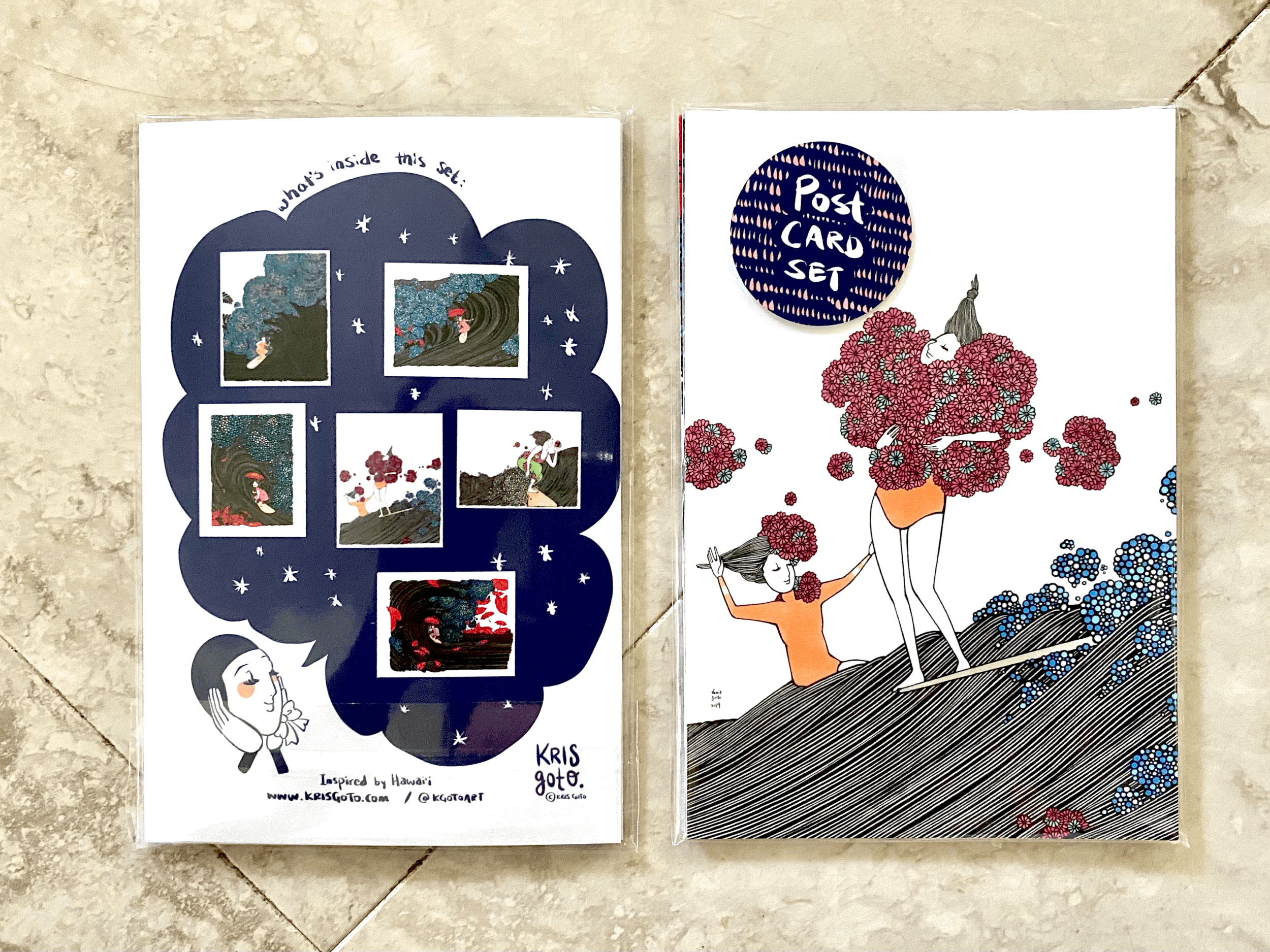 Kris Goto Card Collection featuring artistic greeting card designs, showcasing the themes of 'LOVE' and 'PADDLE'. The collection highlights vibrant illustrations on a textured background, perfect for sending heartfelt messages.