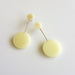 handmade cream circle acrylic earrings