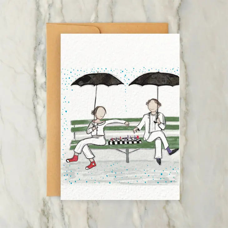 male and female playing chess greeting card