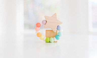 silicon teething ring and wooden star
