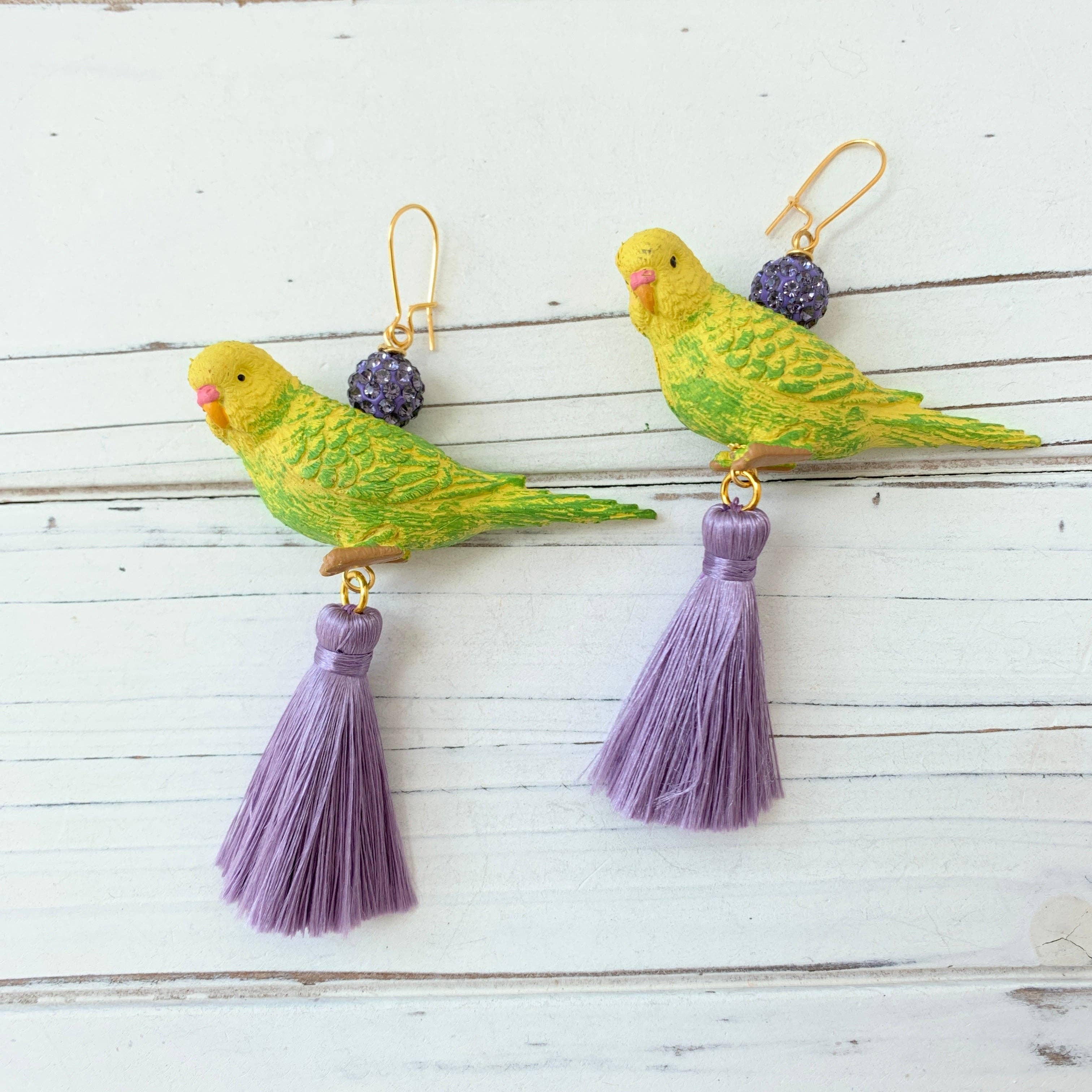 bird drop earrings with purple tassel