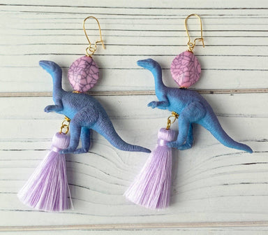 dinosaur earring with purple tassel