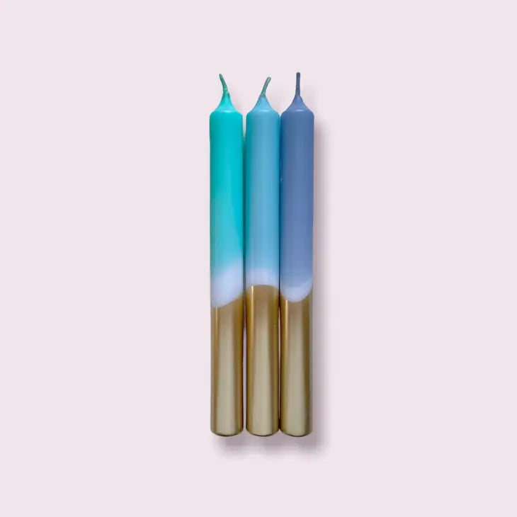 blue and gold pillar candle
