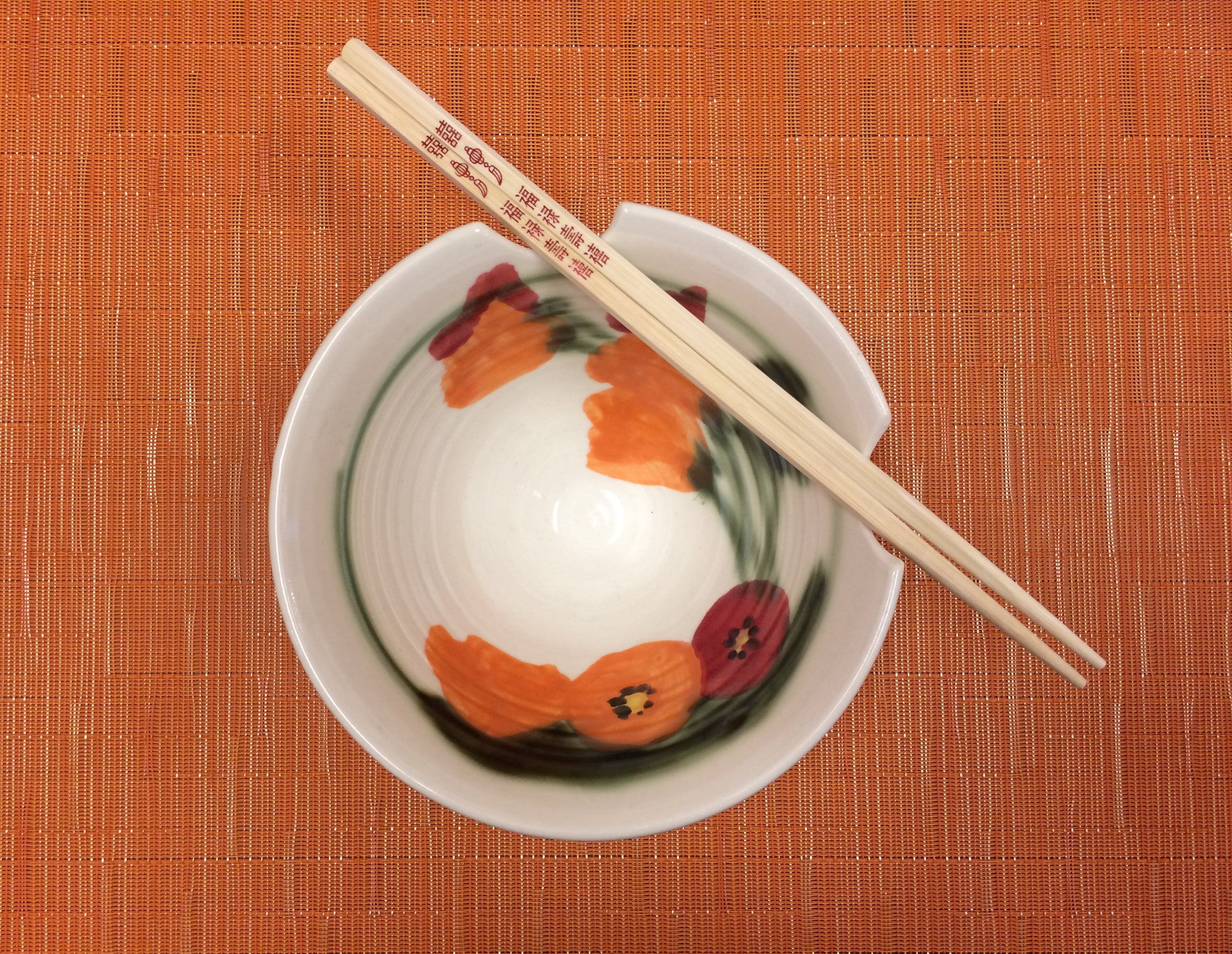 handmade ceramic bowl with chopsticks