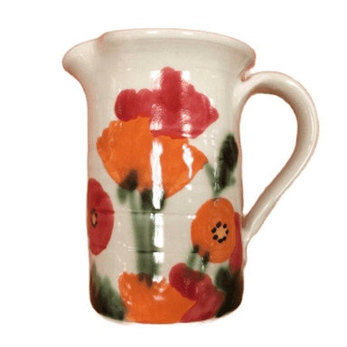 handmade ceramic pitcher with poppies