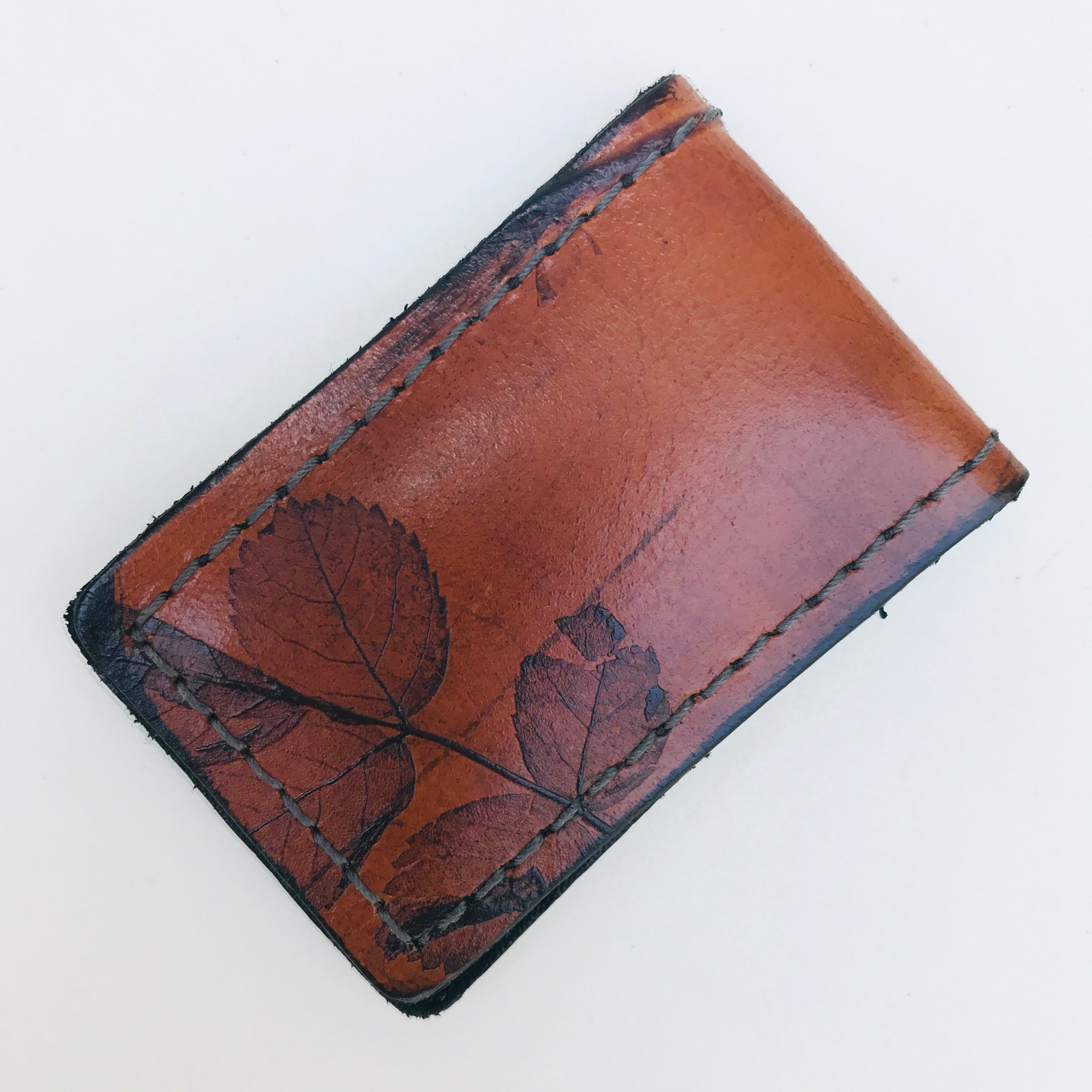 brown leather money clip